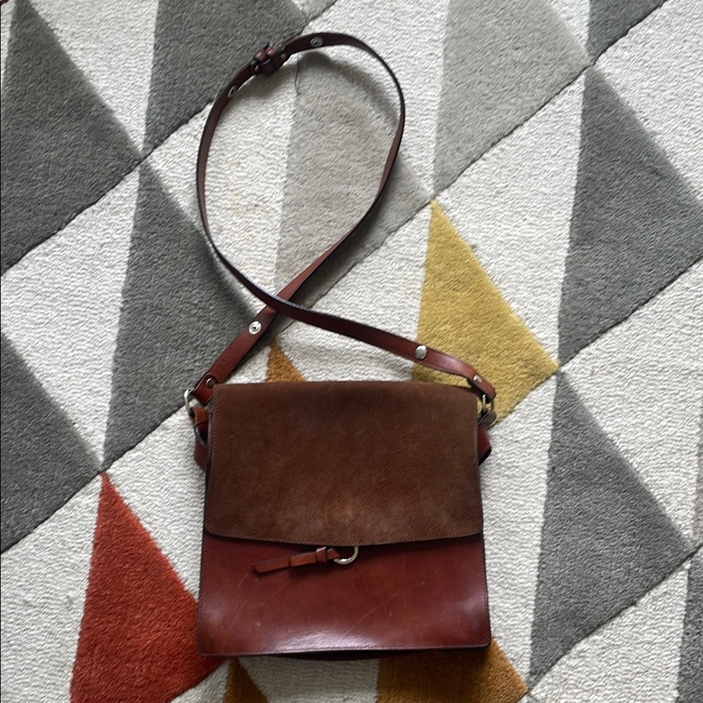 Closed Brown Leather Crossbody Bag with Flap Closure